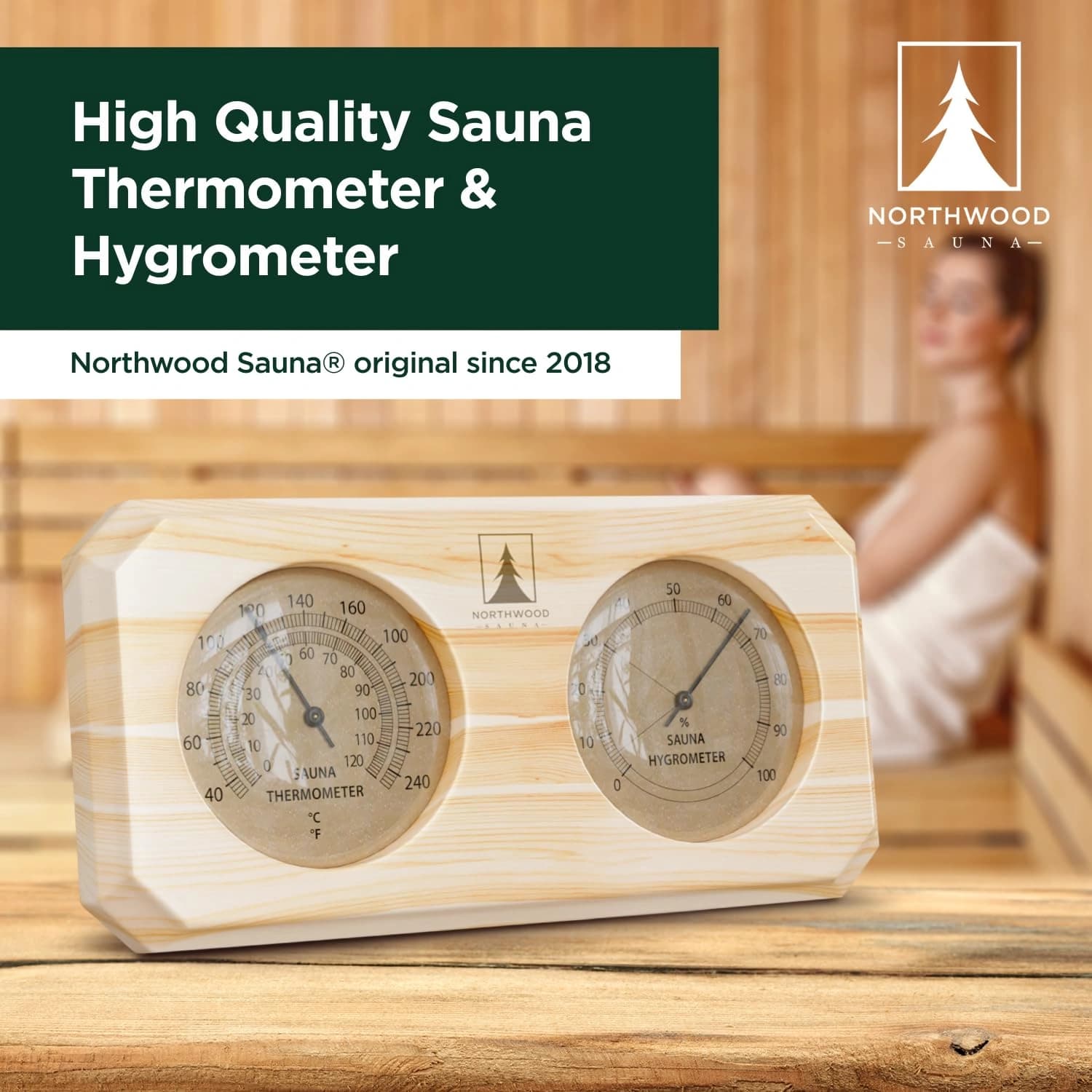Sauna thermometer and hygrometer combo mounted on wooden wall showing temperature and humidity readings