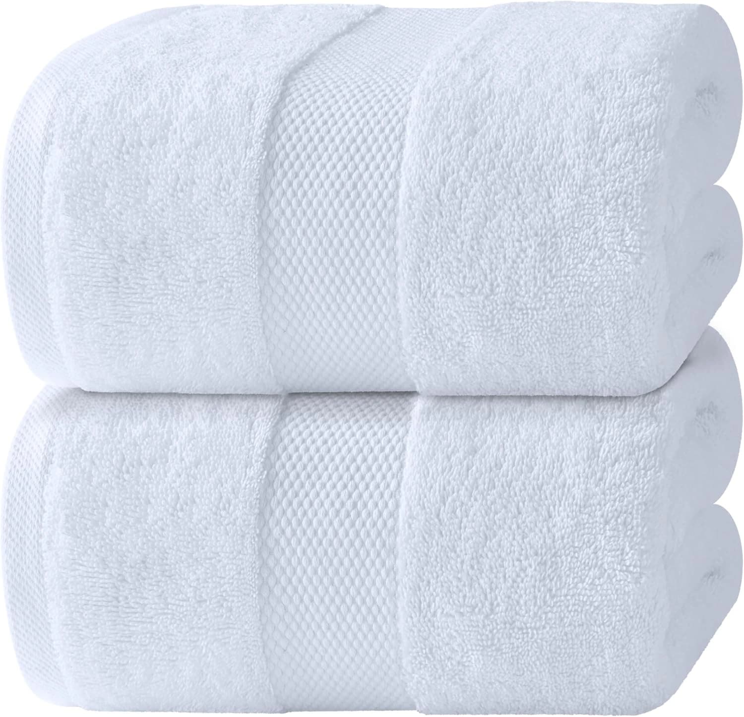 Plush Turkish cotton sauna towels folded on wooden bench, ultra-absorbent and heat-resistant